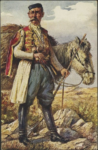 [Muškarac u narodnoj nošnji u crnim čizmama s magarcem]